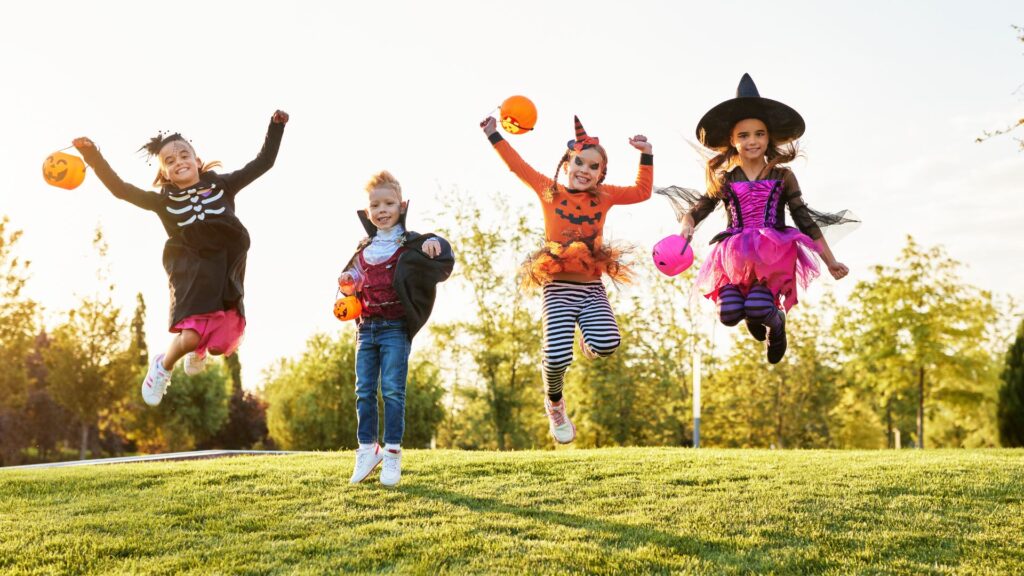 kids trick or treating in halloween costumes