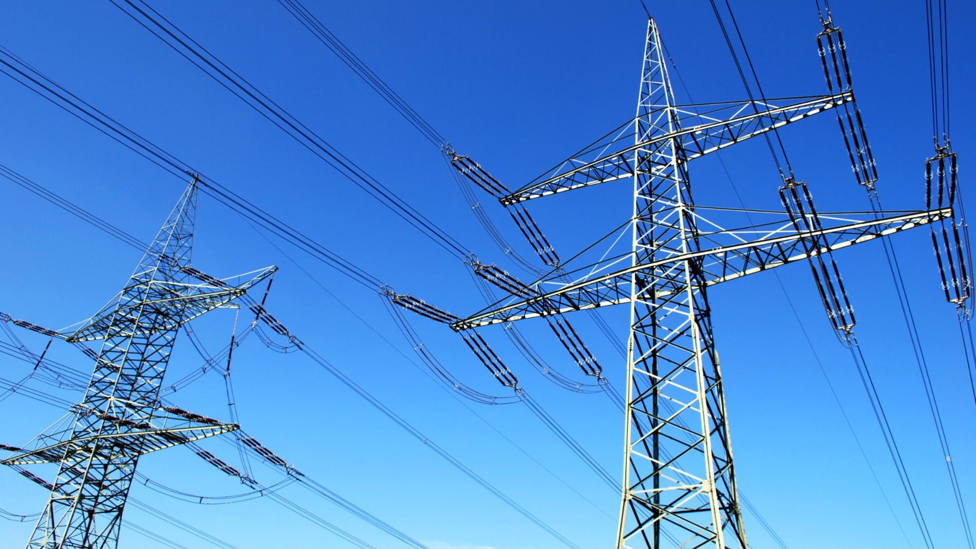 image of pylons against a blue sky